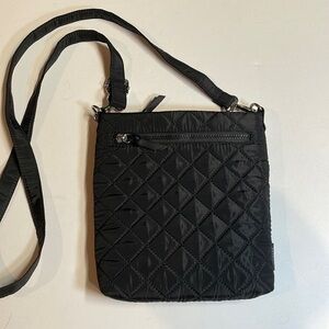 Rae Dunn woman’s black quilted handbag